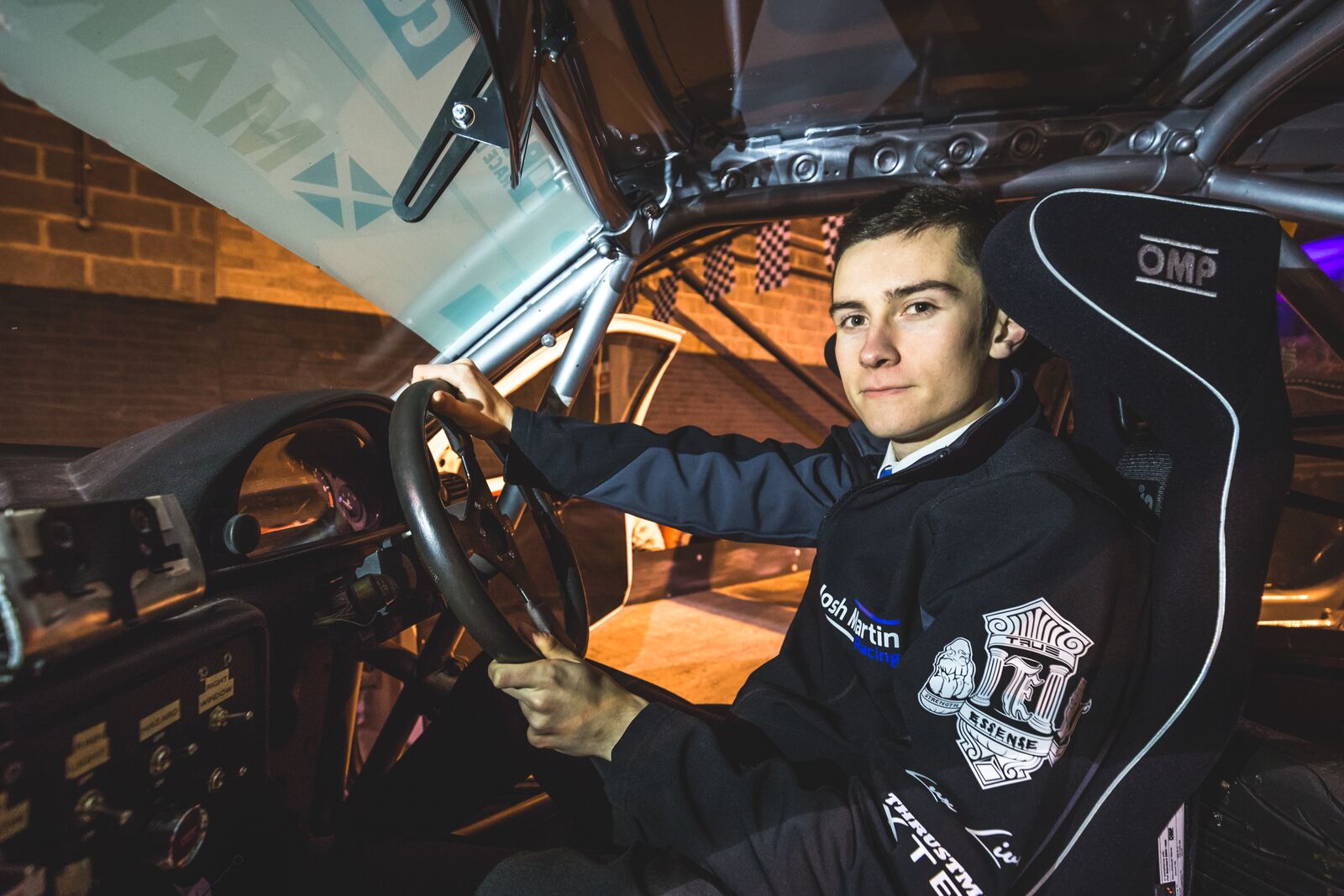 photo of Josh Martin sitting in racing car